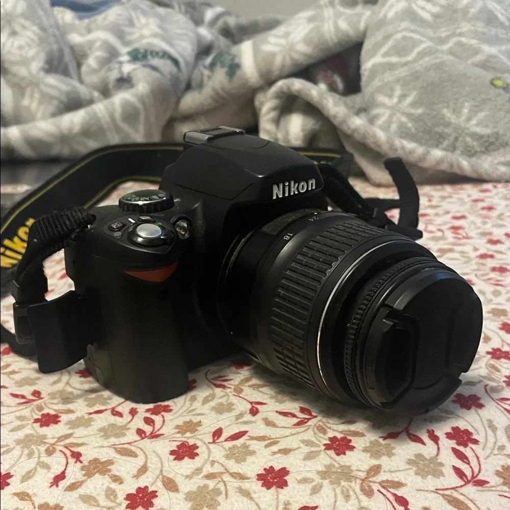 Nikon Black DSLR with Lens